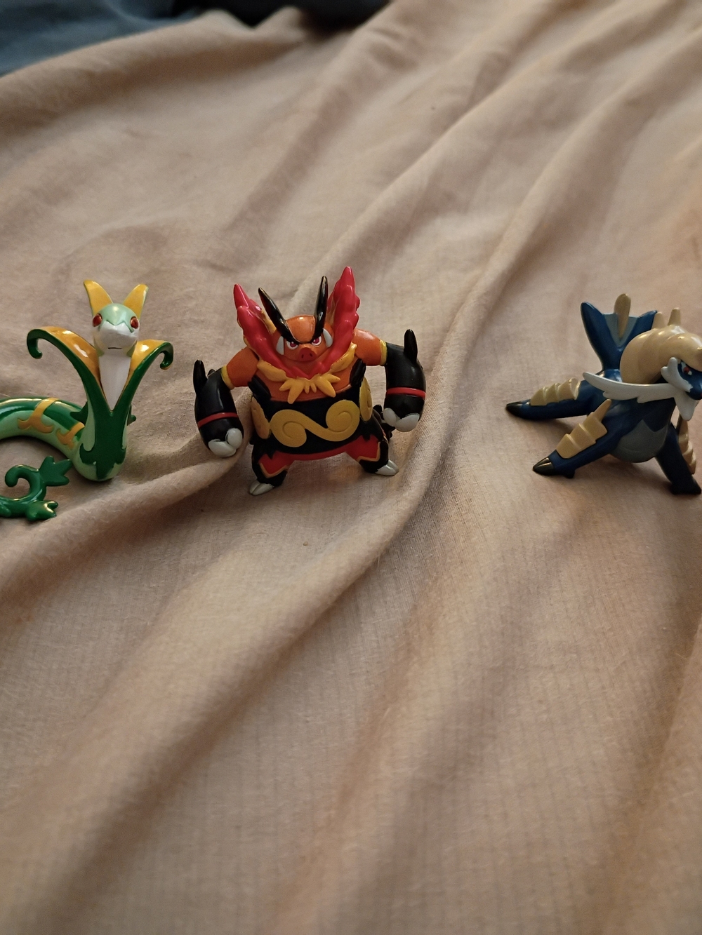 Three Pokemon Tomy Figures